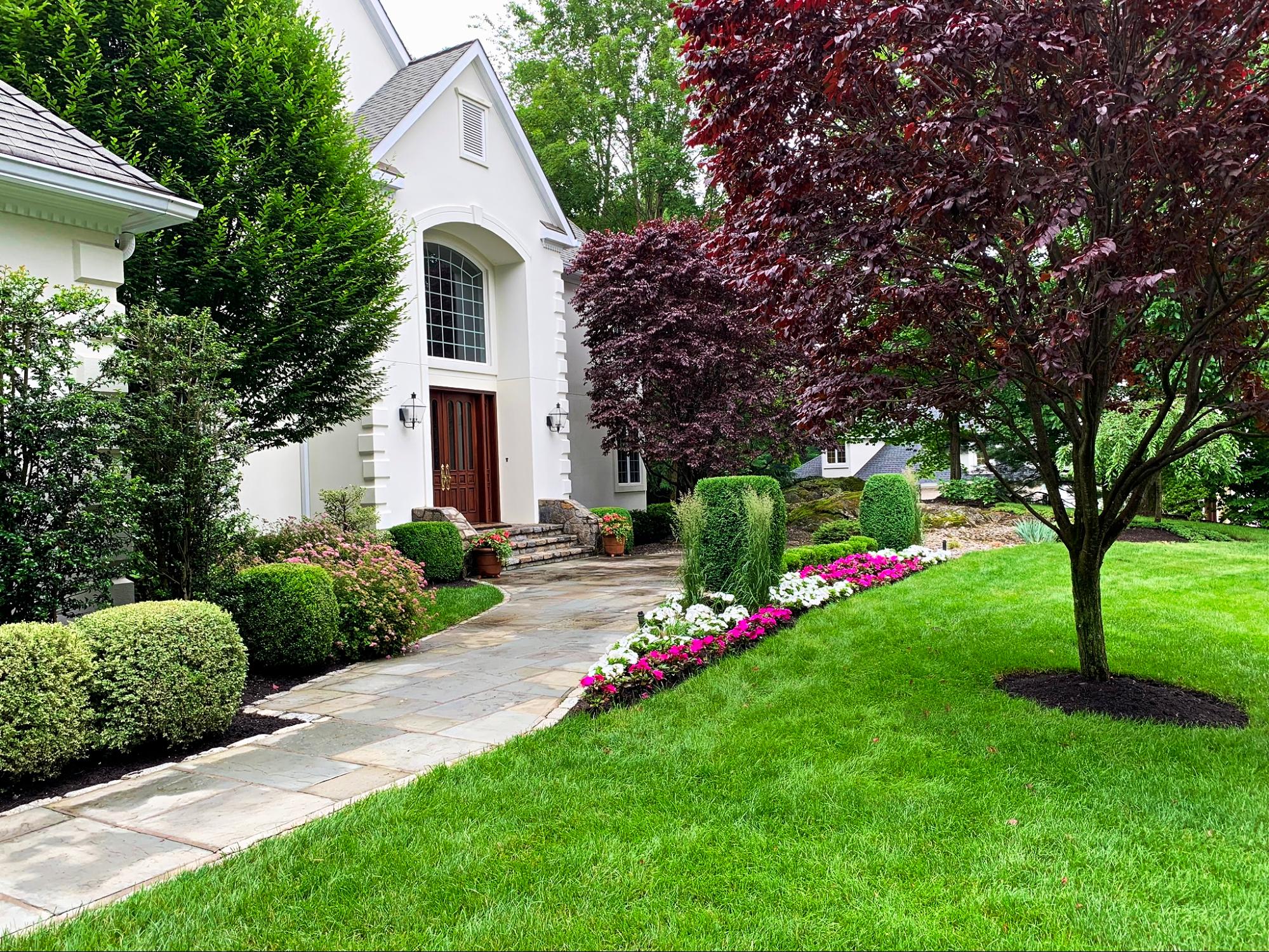  Land of ELITE is a professional landscape designer that provides landscape maintenance by planting trees, pruning shrubs, and annual mulch application