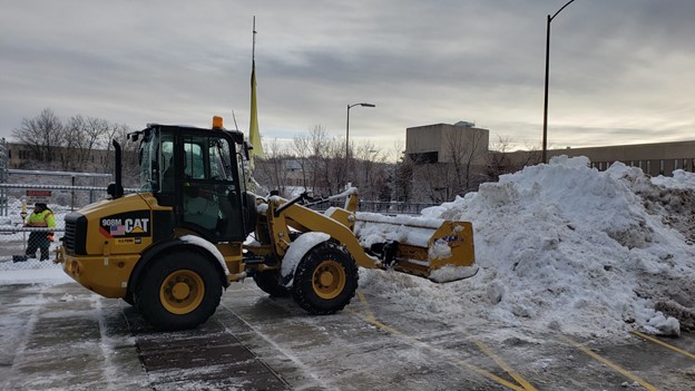 snow and ice management using machinery