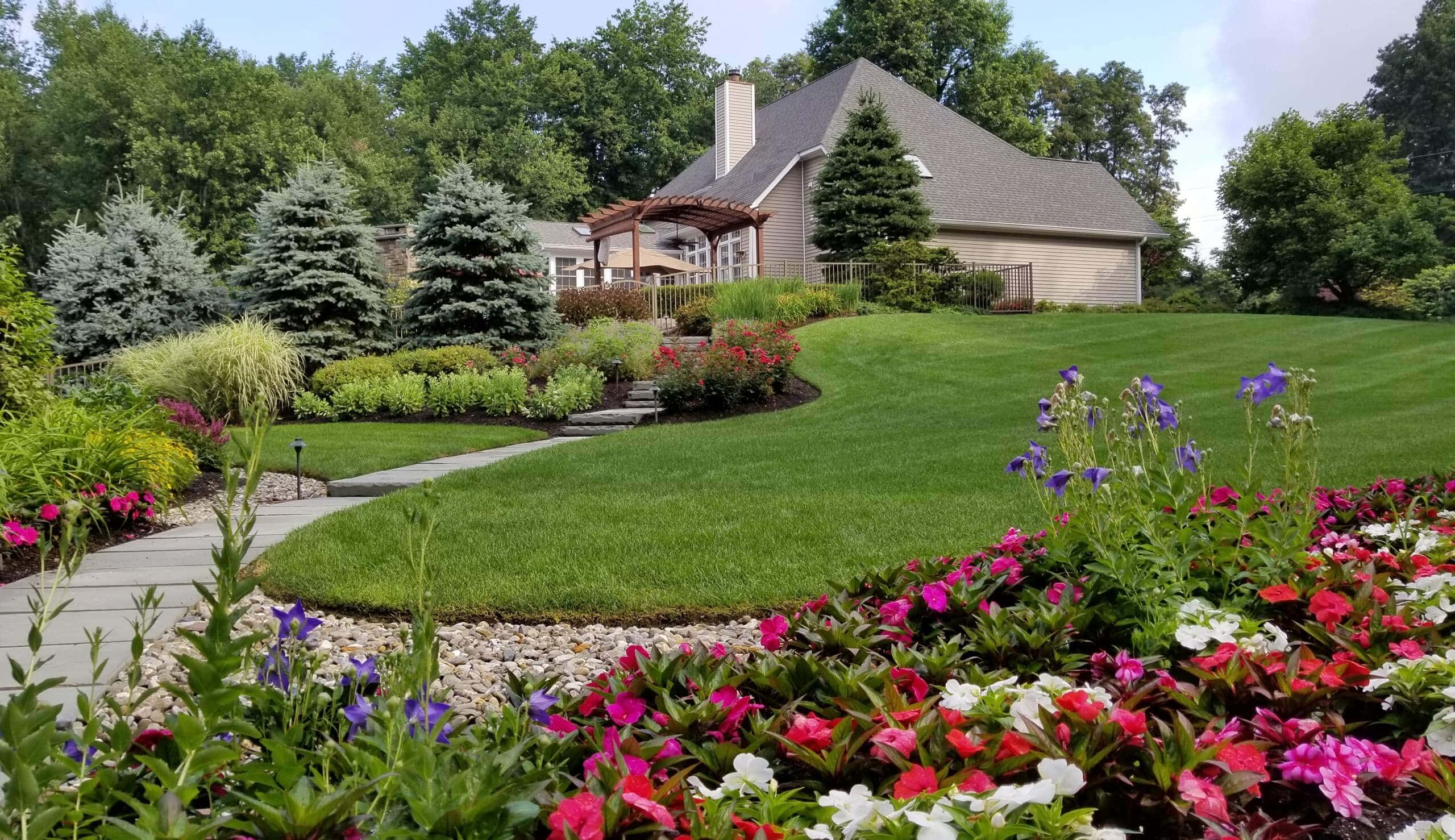 A residence in New York with well-maintained professional landscaping