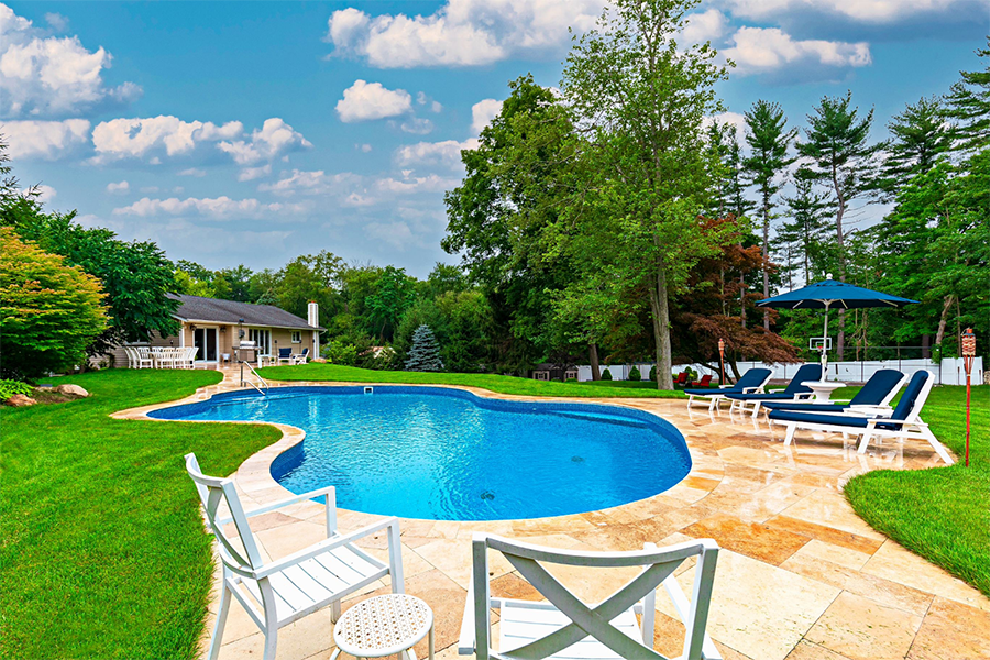 Beautiful and well maintained outdoor pool concept image for opening your pool for the season.