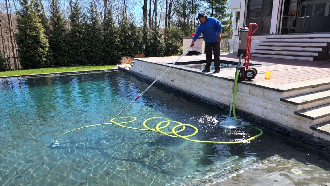 Pool brush used by a professional pool cleaner for outdoor and indoor pools in New York