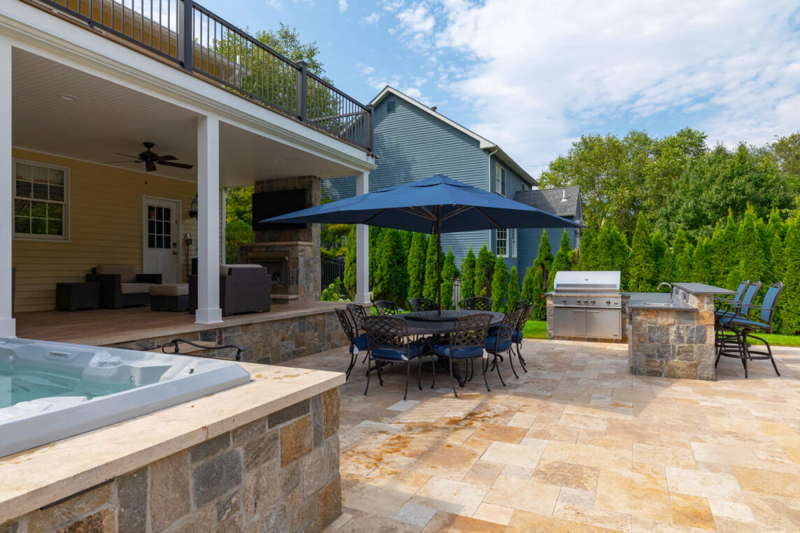 outdoor kitchen seemlessly integrated with hardscape patio