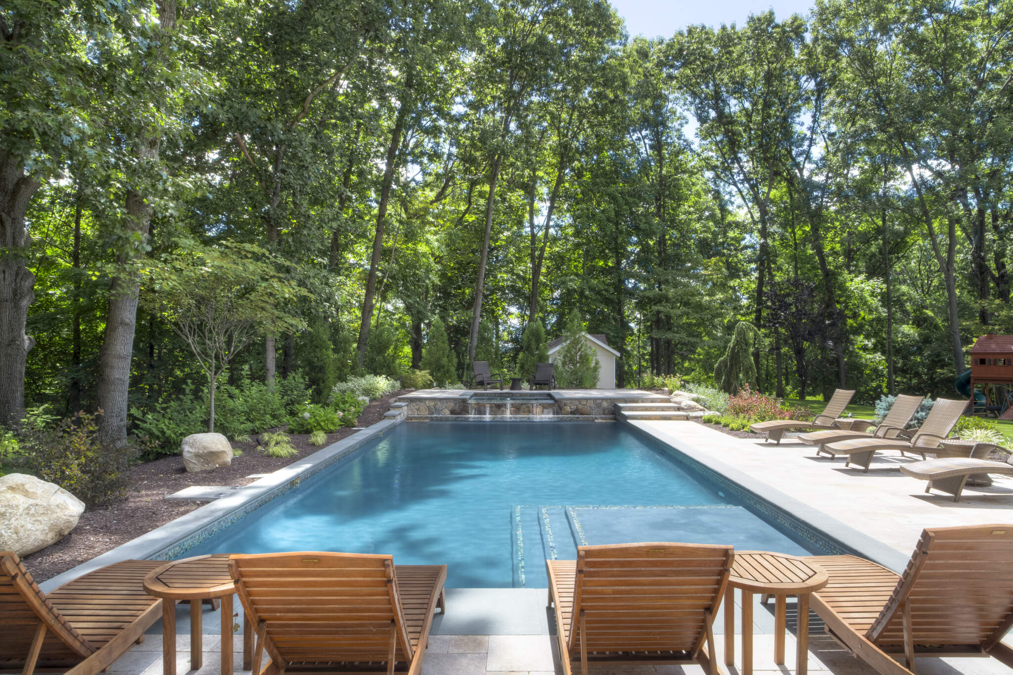 geometirc pool in the standard rectangle shape in a small backyard