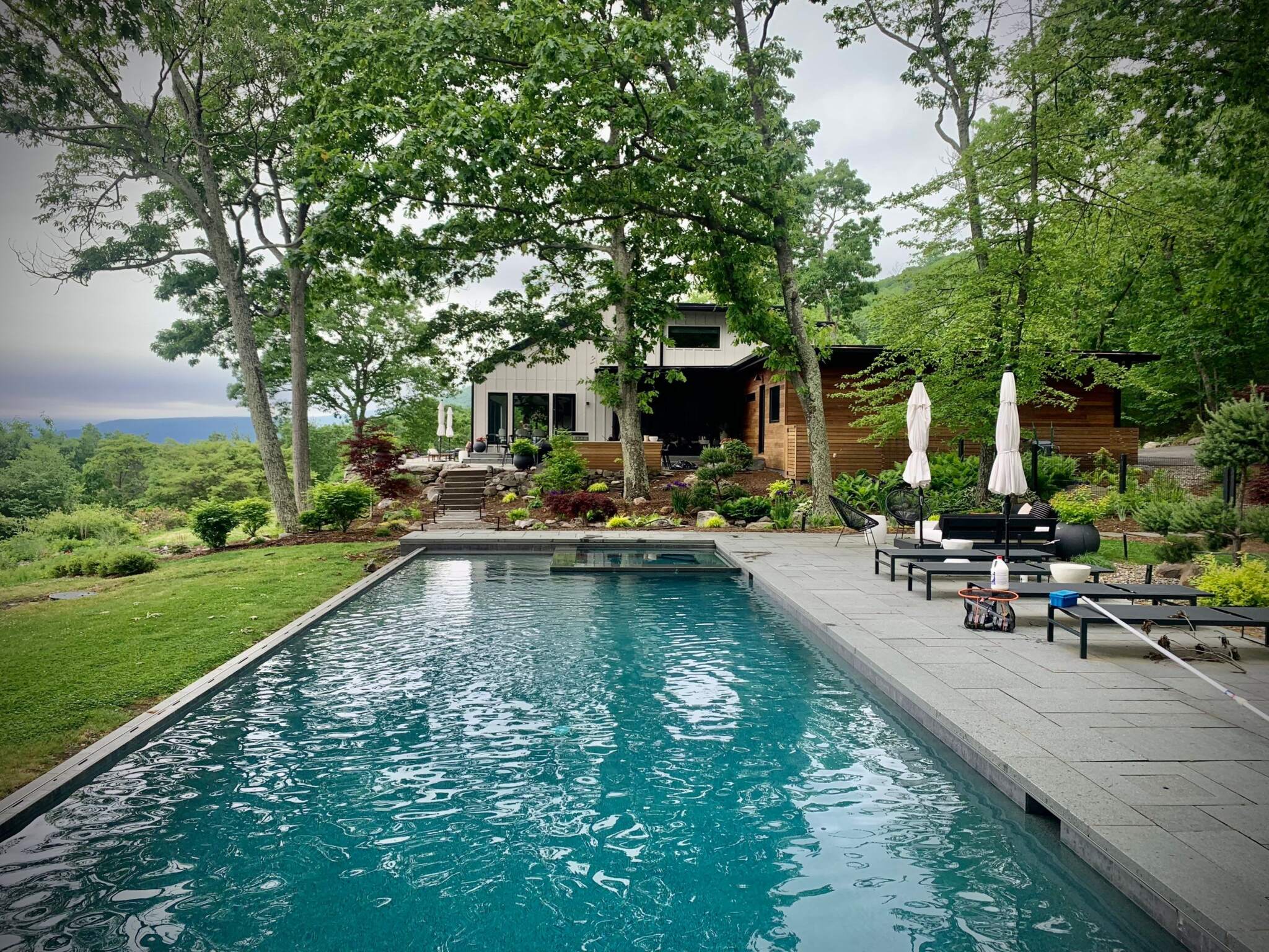 small backyard pool design, a luxury outdoor space created by Land of ELITE